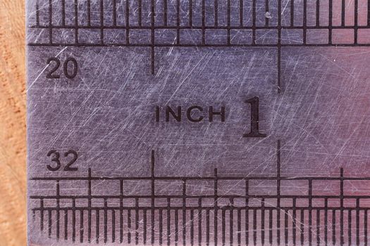 Iron line. Scale of inch. Close-up. Macro effect photo. High quality photo