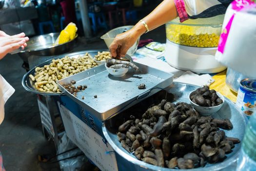 Asian street food night market. Mobile food counters. Snack Counter.