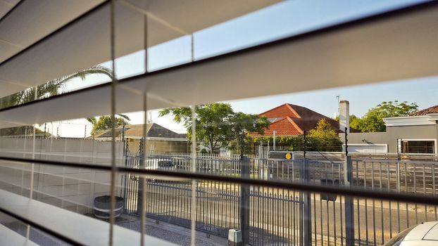 Looking outside behind bars in Cape Town, South Africa. Like Prison.