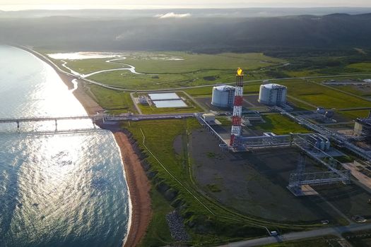 A liquefied natural gas plant and a terminal for its transportation.