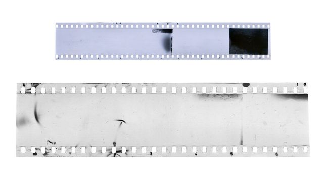 Strip of old celluloid film on white background