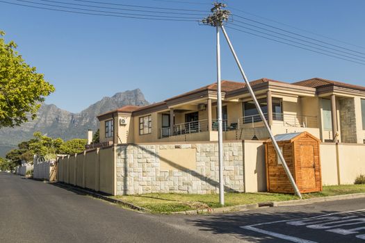 House with fences with Table Mountain view in the idyllic Claremont in Cape Town, South Africa.