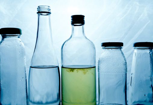 composition of glass bottles on a light background. High quality photo