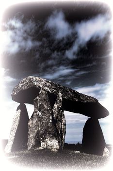 Toned image of the Pentre Ifan a prehistoric megalithic communal stone burial chamber which in Pembrokeshire Wales UK a popular travel destination landmark stock photo