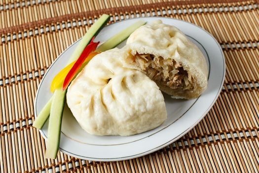 Korean national food. Mince pie on a bamboo background closeup Beautiful concept background