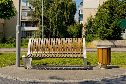 Bench on the alley in the park.