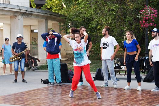 Varna, Bulgaria - July, 19, 2020: young street dancers and musicians show performance