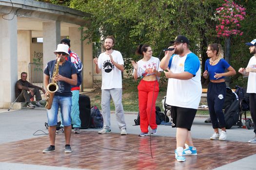 Varna, Bulgaria - July, 19, 2020: young street dancers and musicians show performance