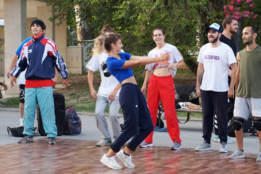 Varna, Bulgaria - July, 19, 2020: young street dancers and musicians show performance