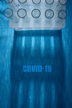 Laboratory test tube poster and test tube shadow - covid-19 virus