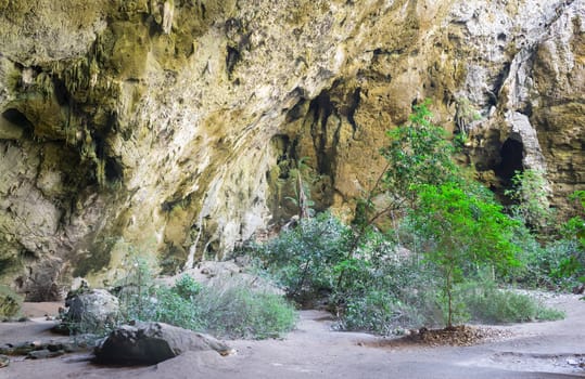 Inside Phraya Nakhon Cave with Stalactites and Stalagmites and green tree at Prachuap Khiri Khan Thailand. Natural cave in unseen Thailand