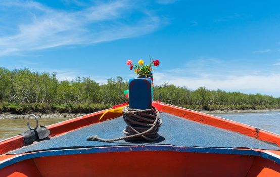 Khao Dang canal boat trip at Prachuap Khiri Khan Thailand. Boat or fishing boat with blue sky and cloud and green tree and water. Landscape or scenery summer concept for boat trip