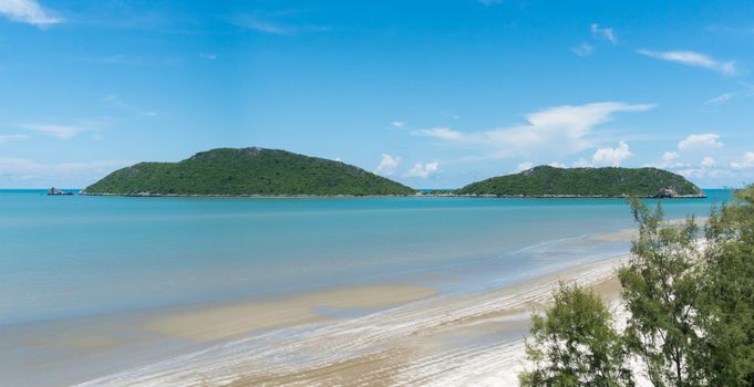 Lam Sala Beach with Blue Sky and Rock Mountain or Hill and sea and tree at Prachuap Khiri Khan Thailand. Landscape or scenery summer season concept