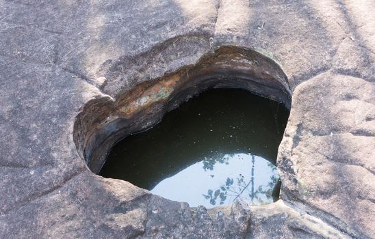 Natural Heart Shape Stone Pond at Phayao Attraction Northern Thailand Travel. Natural heart shape pond with warm sun light and water at Phayao landmark northern Thailand travel