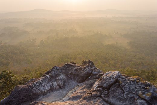 Pha Hua Rue Rock Cliff Mountain Hill Phayao Attractions Thailand with Warm Sun Light and Green Tree Landscape Top. Natural stone or rock mountain hill at Phayao northern Thailand travel