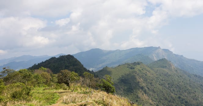 Landscape Mountain with Meadow Tree Sky and Cloud at Phu Chi Fa Forest Park. Landscape Phu Chi Fa Forest Park view point Chiang Rai northern Thailand travel