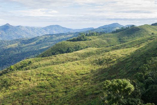 3 Green Tree Mountain with Warm Sun Light and Blue Sky Cloud at Phu Langka National Park Zoom. Green Tree Mountain or Hill at Lan Hin Lan Pee Phu Langka National Park Northern 
Phayao Thailand Travel