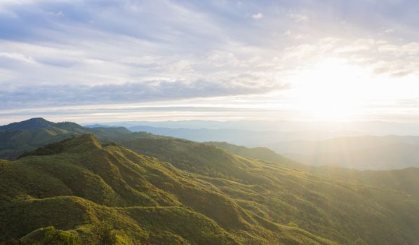 Landscape Phu Langka Mountain National Park Phayao Thailand Travel Wide. Green tree mountain and cloud sky and warm sun light at Phu Langka national park view point 
Phayao Thailand. Northern Thailand travel