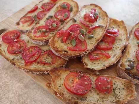 homemade sandwiches made from homemade bread, fresh tomatoes baked under the grill
