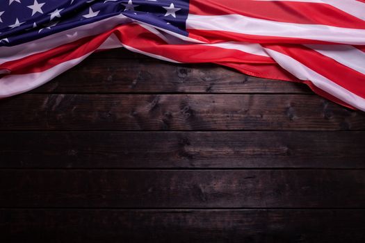 The American Flag Laying on a Rich Old Wooden Background