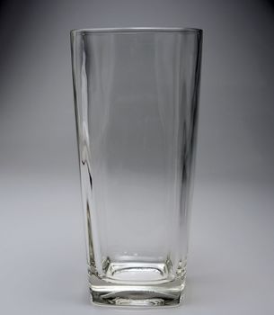 Empty glass On a gray background.