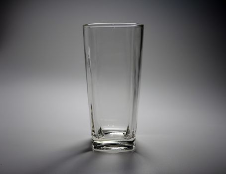 Empty glass On a gray background.