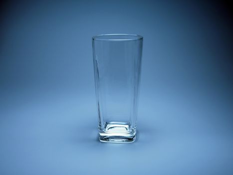 Empty glass On a blue background.