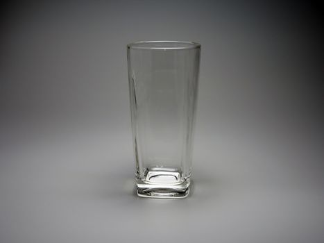 Empty glass On a gray background.