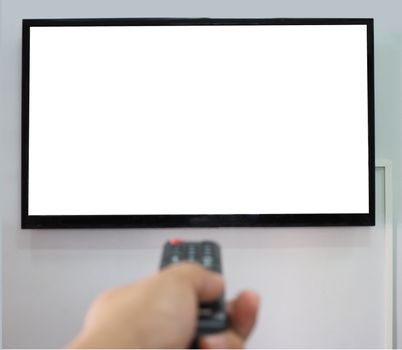 Empty TV screen  and the hand is holding the remote control to change the channel.