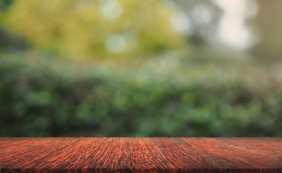 Empty wood on natural blurred background.