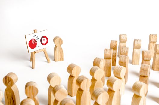 A person holds a presentation to a crowd of people at a briefing, a discussion of the business strategy, development of the company. Analysis of the results, information market analysis and marketing