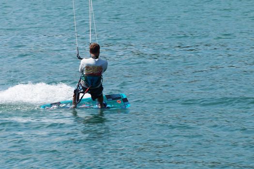 Varna, Bulgaria - July, 19, 2020: a man is kiting the sea