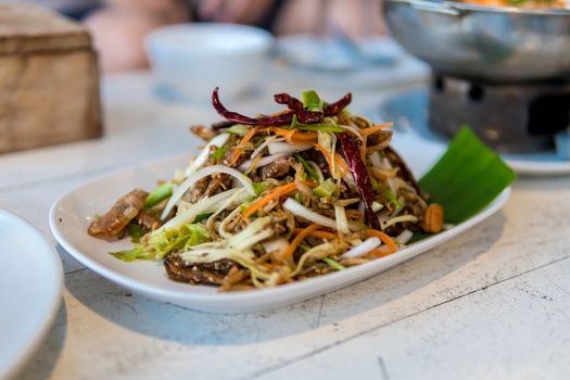 crispy little fish spicy salad on dish