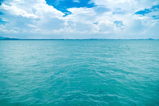 ocean view with cloudy sky background