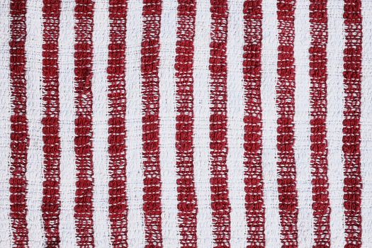 Red and white striped dish cloth tea towel texture background stock photo