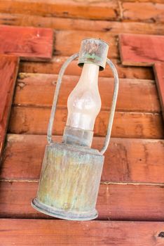 Vintage outdoor garden street wall metal electrical lamp in town or village