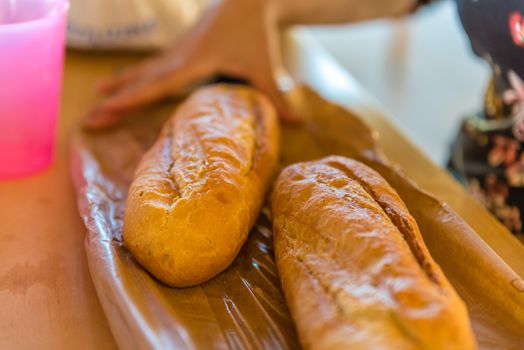 woman preparing sandwich