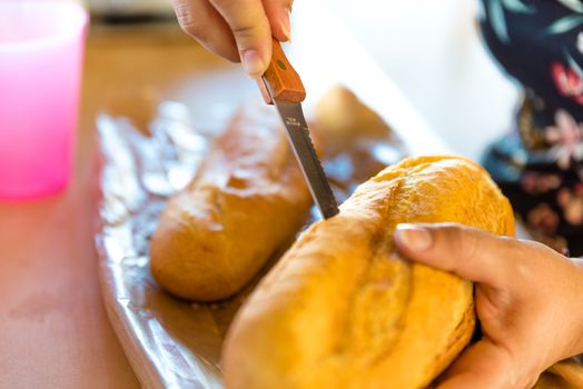 woman preparing sandwich