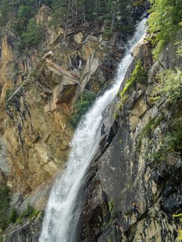 Climbing at the Lehner Waterfall via ferrata near Oberried in the Otztal, Tyrol, Austria