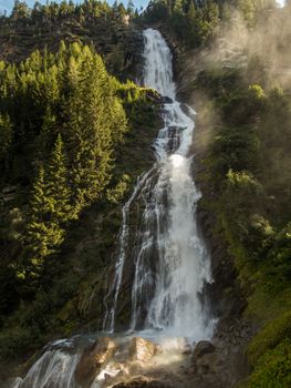 Climbing on the Stuibenfall via ferrata near Umhausen in the Otztal, Tyrol, Austria