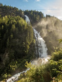 Climbing on the Stuibenfall via ferrata near Umhausen in the Otztal, Tyrol, Austria