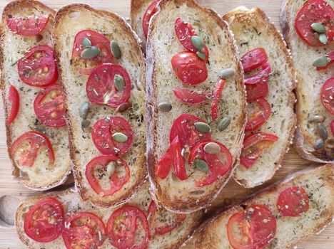 homemade sandwiches made from homemade bread, fresh tomatoes baked under the grill