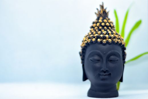 Buddha head Figurine statue is not just the depiction of the head of the buddha and symbolic as well as spiritual representation of the enlightened wisdom and knowledge