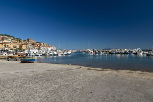 porto santo stefano,italy july 25 2020:quay where boats go to sea in porto santo stefano