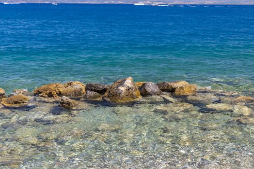 porto santo stefano,italy july 25 2020:rocks in the middle of the sea in porto santo stefano