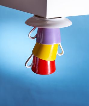 Geyser coffee maker and red cup for coffee shop stand on a white cube. High quality photo