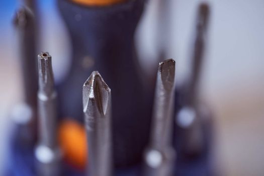 set of screwdrivers on blue blurred background. Close-up. High quality photo