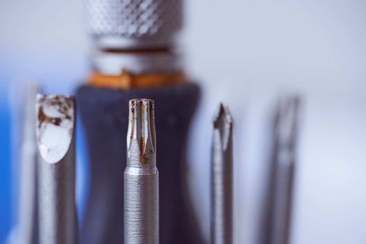 set of screwdrivers on blue blurred background. Close-up. High quality photo