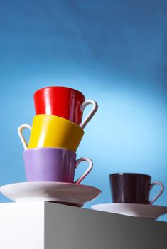 Geyser coffee maker and red cup for coffee shop stand on a white cube. High quality photo