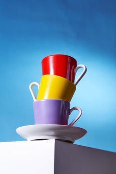 Geyser coffee maker and red cup for coffee shop stand on a white cube. High quality photo